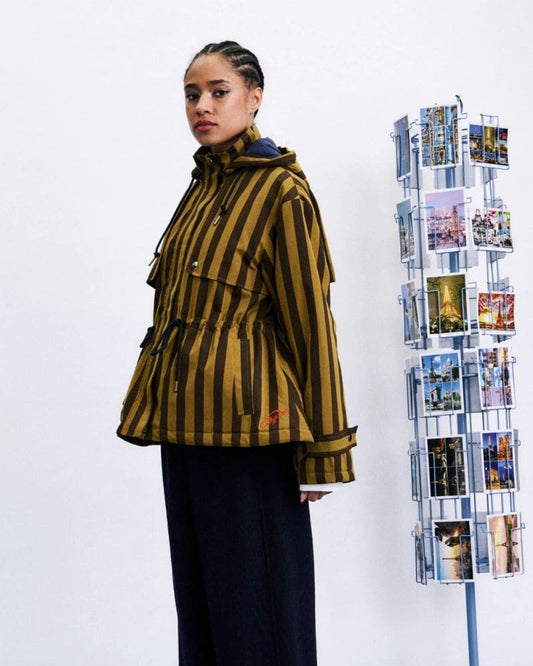 Side view of FRNCH CATBELLS olive hooded jacket with fitted drawstring waist