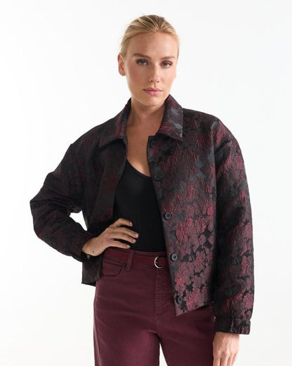 Model styling the Hella wine red jacquard jacket open over a black top