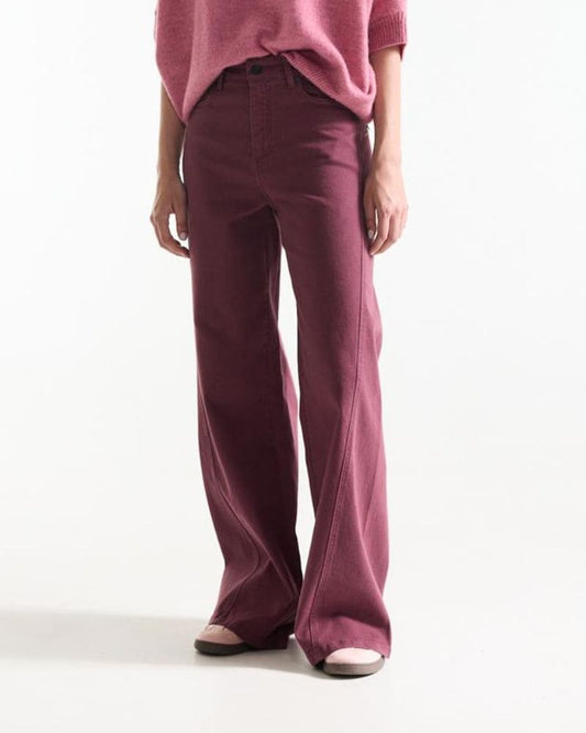 Model wearing wine-red high-waist wide-leg jeans